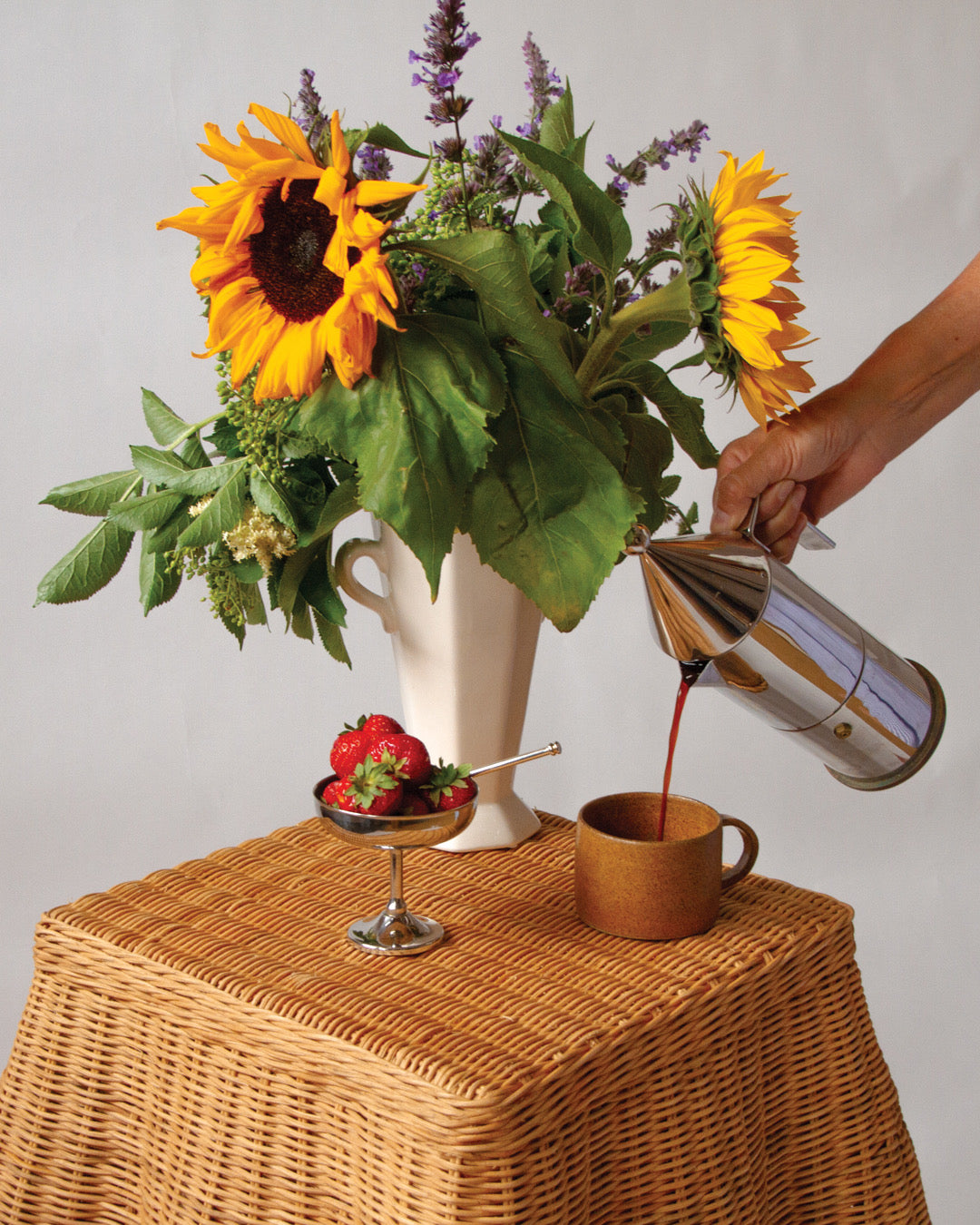 Scalloped rattan side table